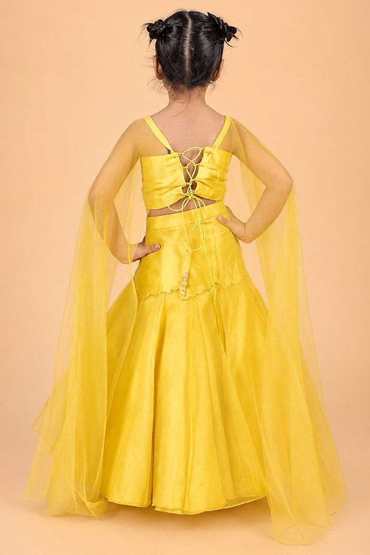 Yellow Uppada Silk Embroidered Lehenga Set For Girls by TURQIDZ at Pernia's Pop Up Shop