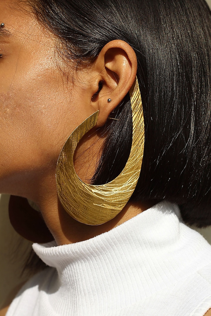 Gold Finish Brass Textured Hoop Earrings by TARSHARI Jewellery
