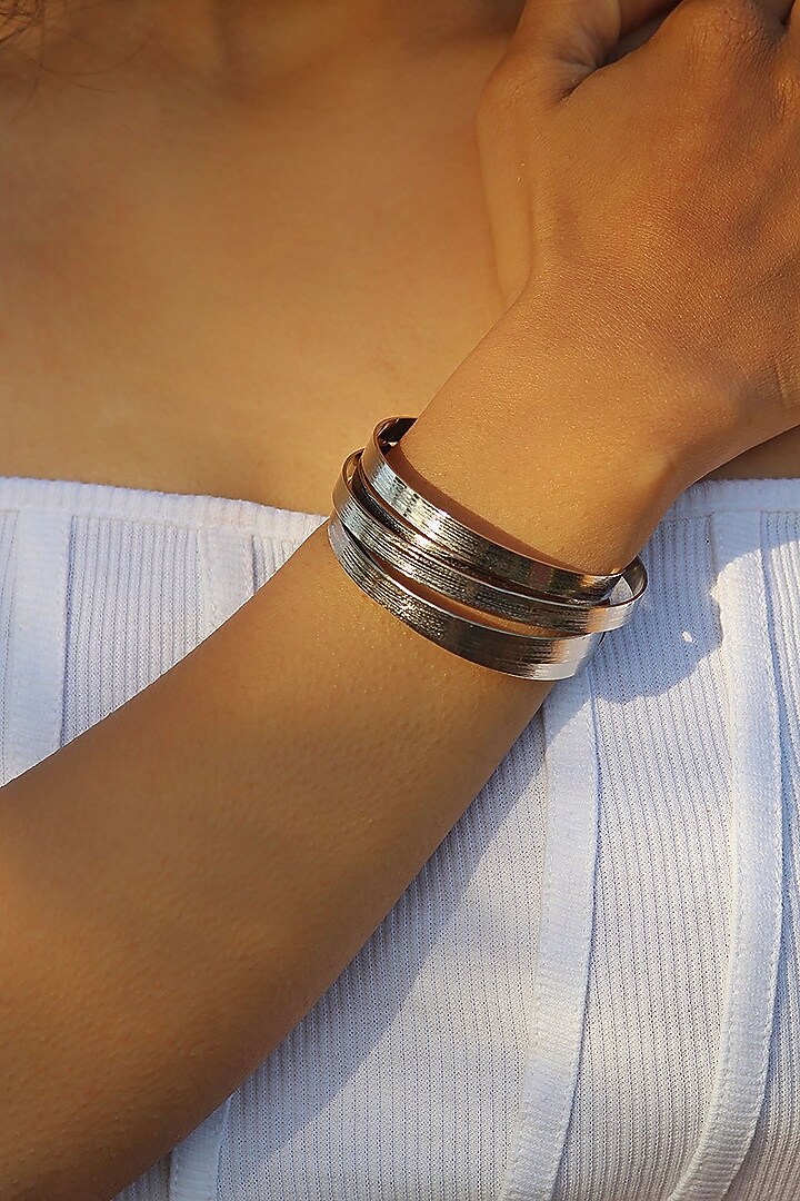 Silver Finish Hand Textured Adjustable Bangles (Set Of 5) by TARSHARI Jewellery at Pernia's Pop Up Shop