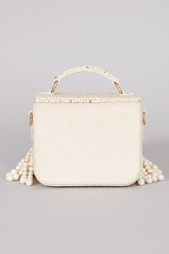 Ivory Hand Embellished Handbag by The Right Sided at Pernia's Pop Up Shop
