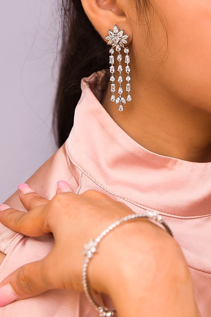 White Finish Cubic Zirconia Dangler Earrings In Sterling Silver by Tres Zuri at Pernia's Pop Up Shop