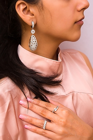 White Finish Dangler Earrings WIth Cubic Zirconia In Sterling Silver by Tres Zuri