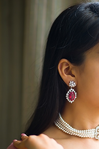 White Finish Dangler Earrings With Red Stone In Sterling Silver by Tres Zuri