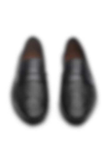 Black Leather Handwoven Penny Loafers by TRUMPET at Pernia's Pop Up Shop