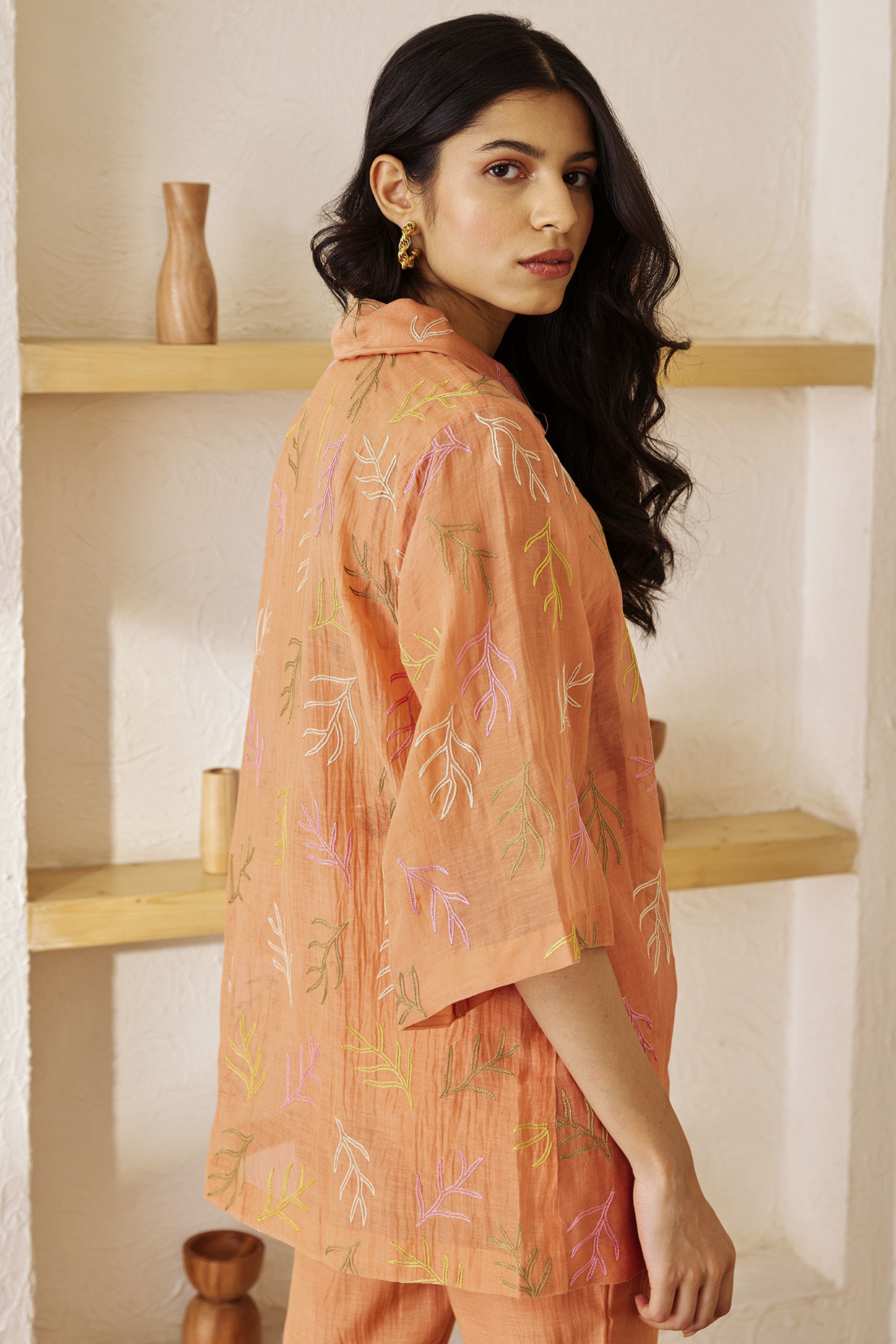 peach embroidered shirt