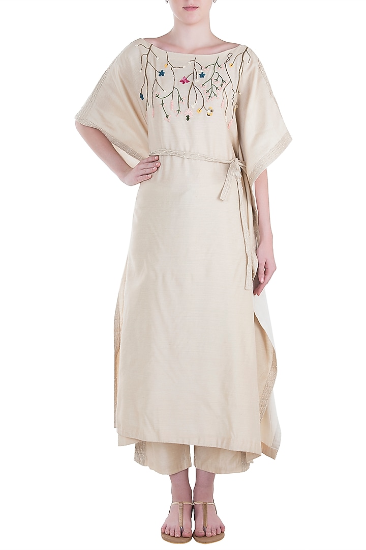 Ivory pintuck embroidered kaftan with trousers and belt available only at Pernia's Pop Up Shop.