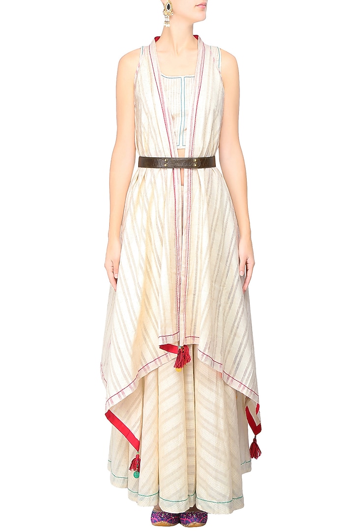 Off white asymmetric jacket with red tassel hangings available only at Pernia's Pop Up Shop.