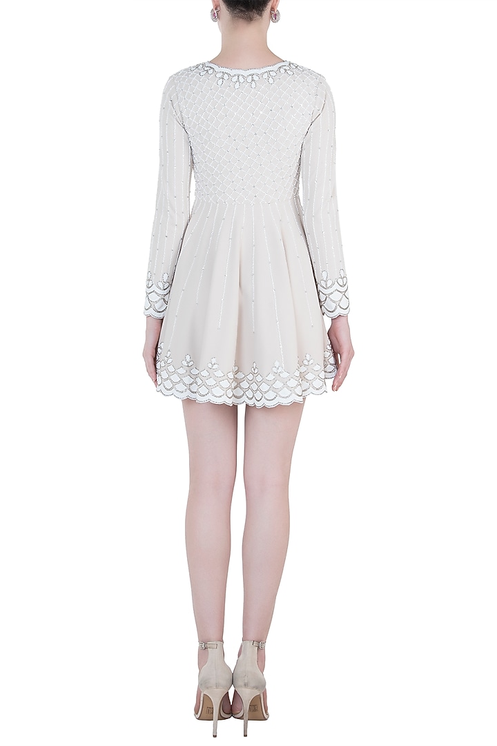 Nude and white embroidered dress available only at Pernia's Pop Up Shop.
