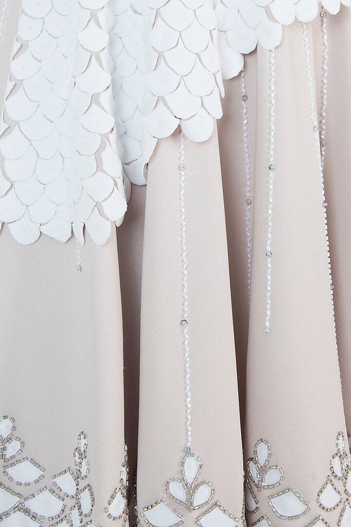 Nude and white embroidered dress available only at Pernia's Pop Up Shop.
