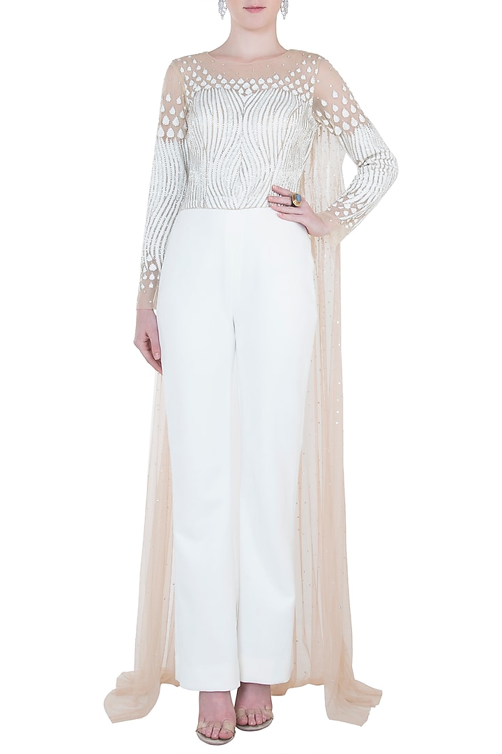 White embroidered jumpsuit available only at Pernia's Pop Up Shop.