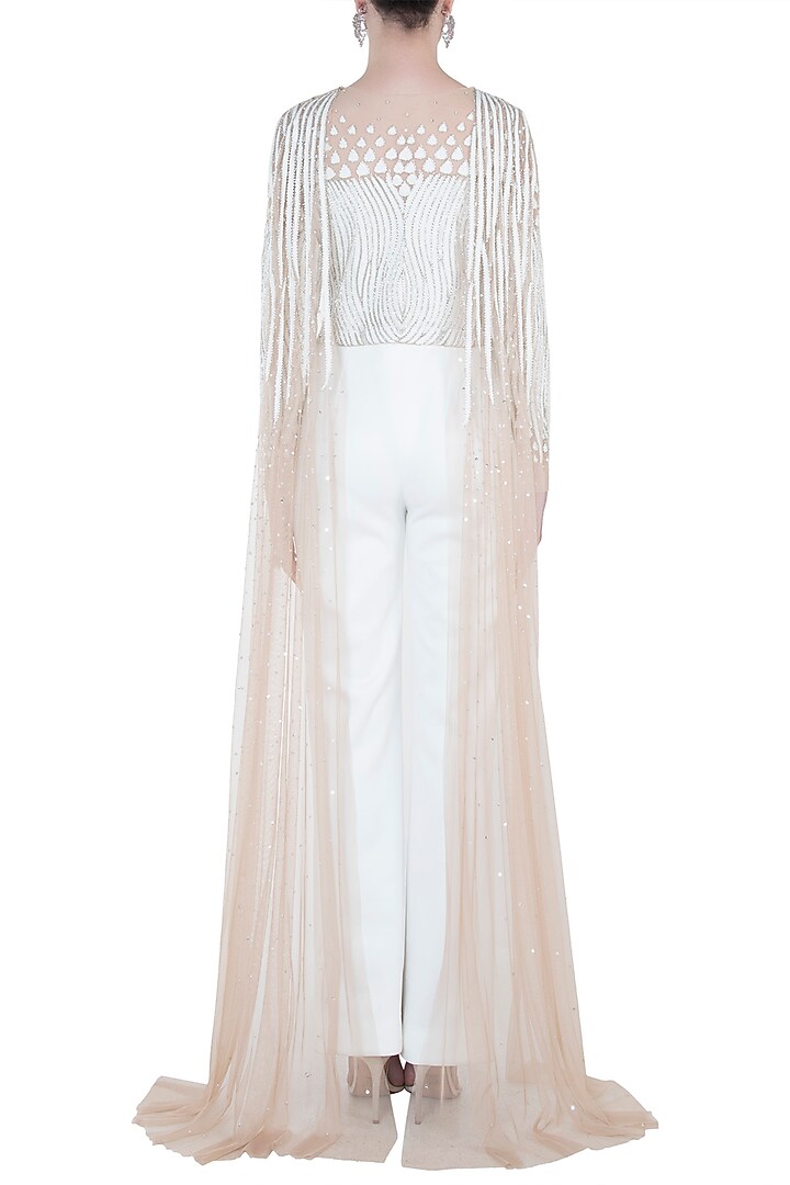 White embroidered jumpsuit available only at Pernia's Pop Up Shop.