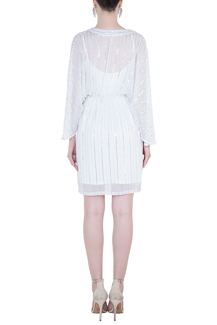 White embroidered dress available only at Pernia's Pop Up Shop.