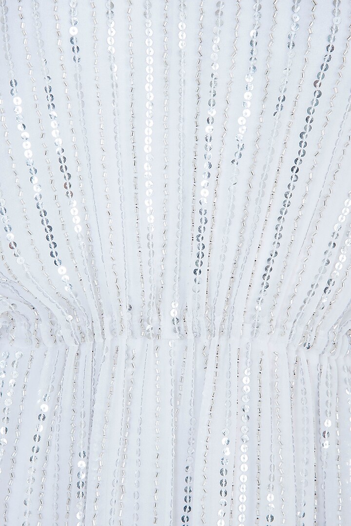 White embroidered dress available only at Pernia's Pop Up Shop.