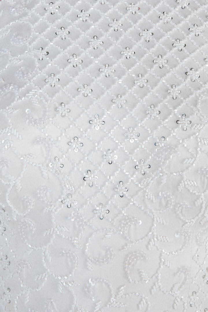 White embroidered dress available only at Pernia's Pop Up Shop.