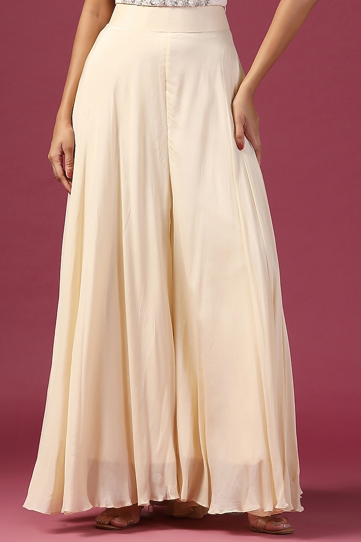 Off-White Georgette Applique Work Sharara Set by Two Sisters By Gyans at Pernia's Pop Up Shop