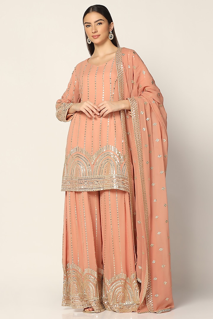 Salmon Pink Georgette Embroidered Sharara Set by Two Sisters By Gyans