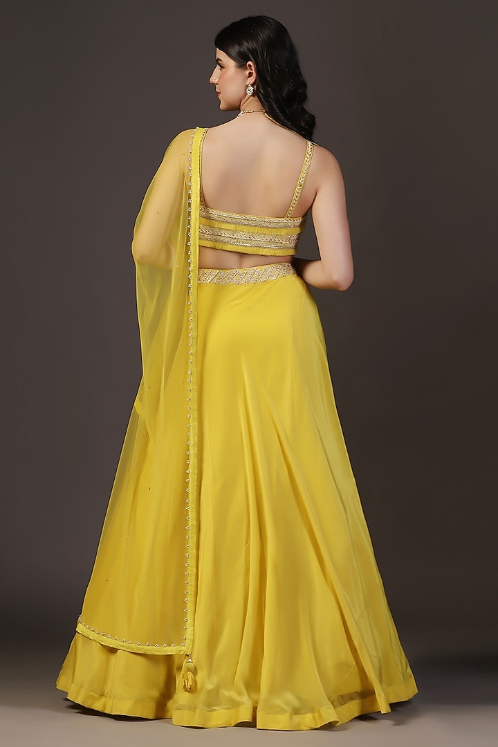 Yellow Crepe Hand Embroidered Wedding Lehenga Set by Two Sisters By Gyans at Pernia's Pop Up Shop