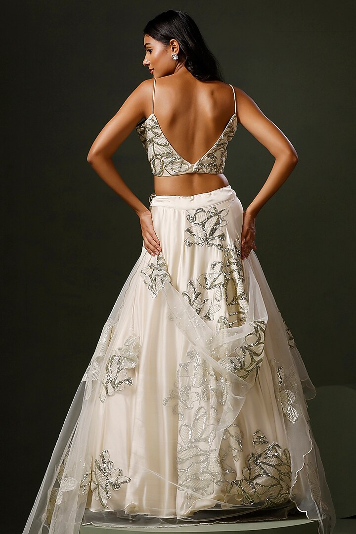Ivory Satin Silk Hand Embroidered Wedding Lehenga Set by Two Sisters By Gyans at Pernia's Pop Up Shop