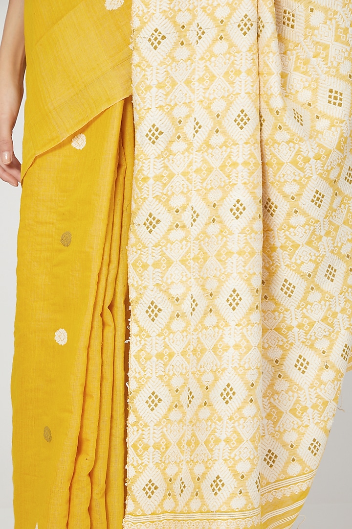 Tumeric Yellow Dyed Saree Set by The Silk Chamber at Pernia's Pop Up Shop