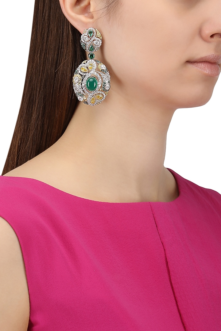Rhodium and gold dual finish zircons and green stones earrings available only at Pernia's Pop Up Shop.