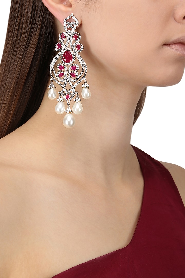 Rhodium finish zircons, ruby and pearl earrings available only at Pernia's Pop Up Shop.