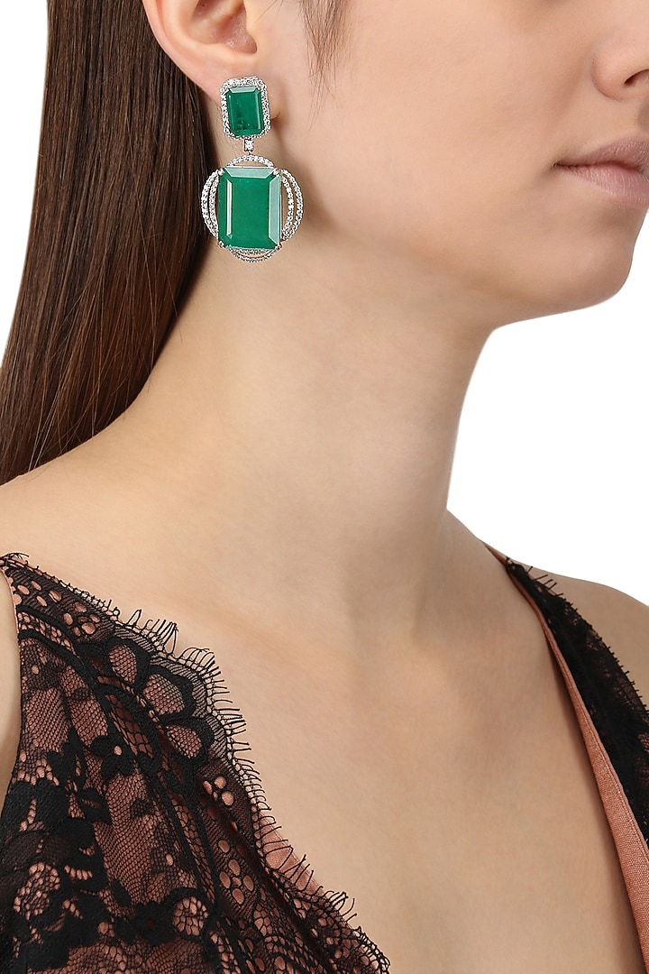 Rhodium finish zircons and emerald stone drop earrings available only at Pernia's Pop Up Shop.