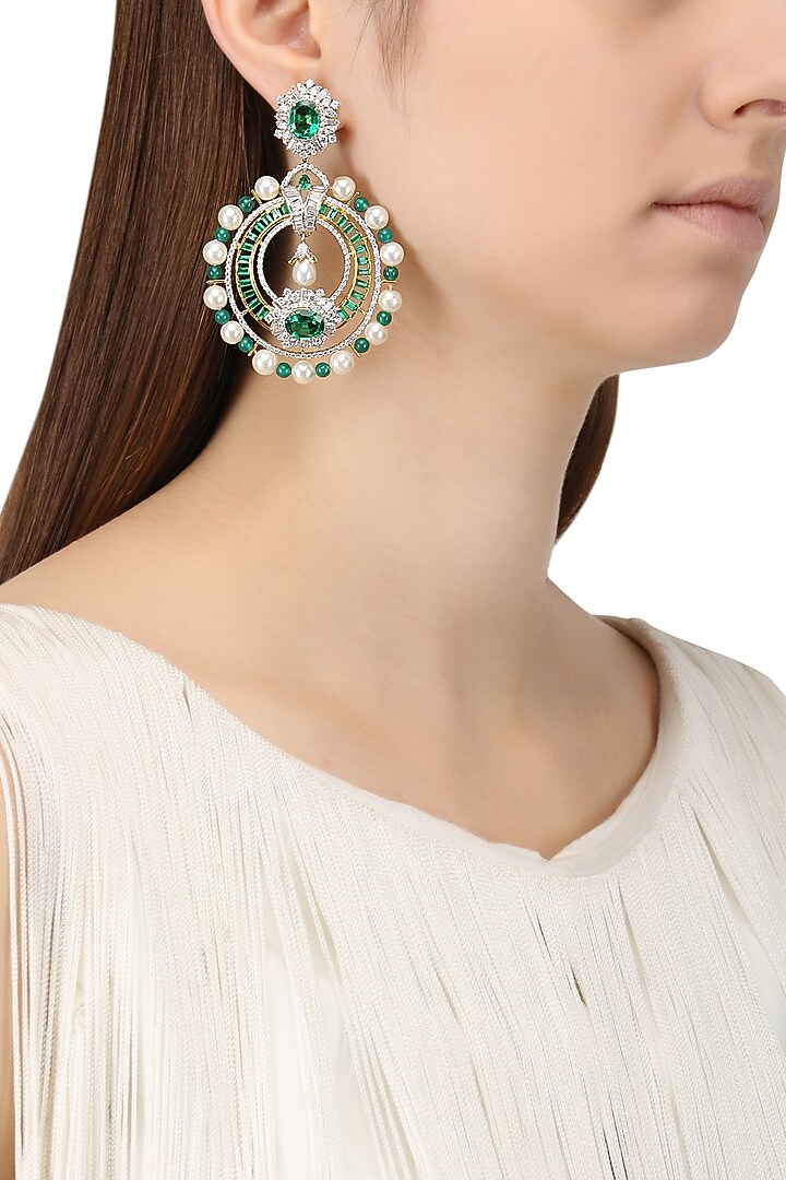 Rhodium and gold dual finish zircons and emerald stone earrings available only at Pernia's Pop Up Shop.