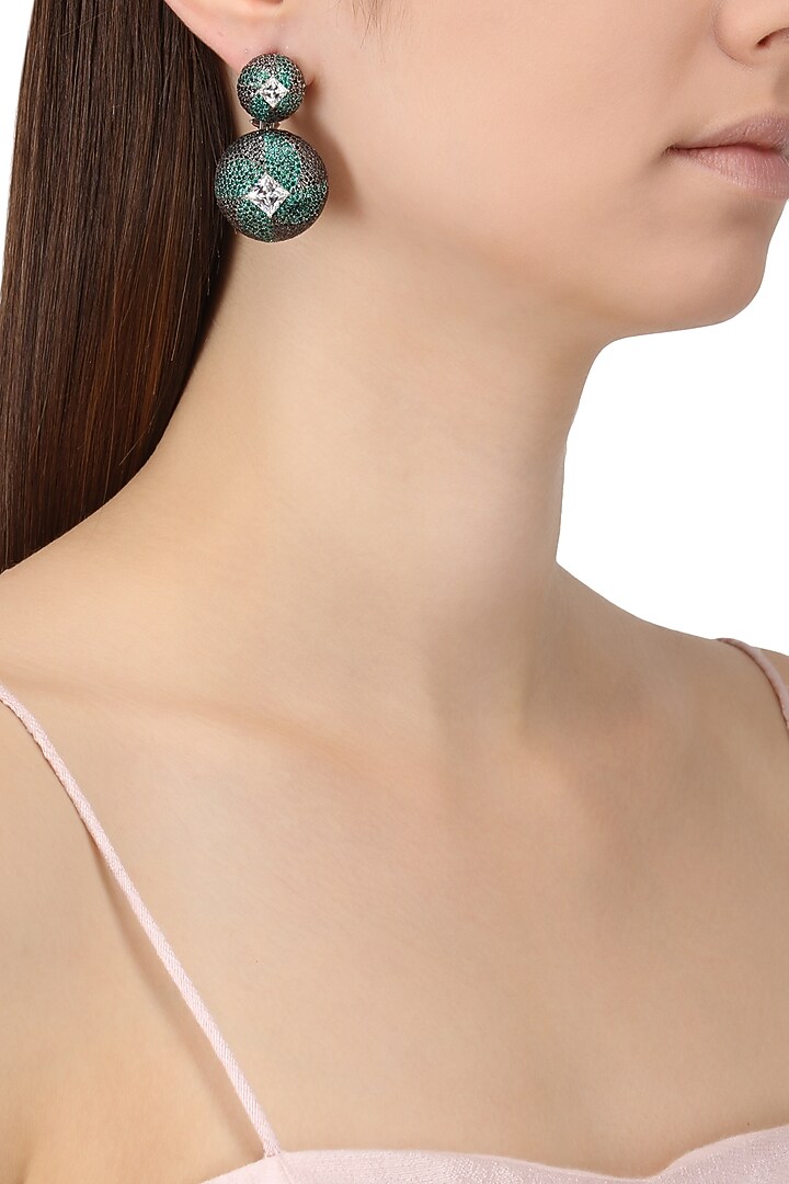 Rhodium finish black and green zircons earrings available only at Pernia's Pop Up Shop.