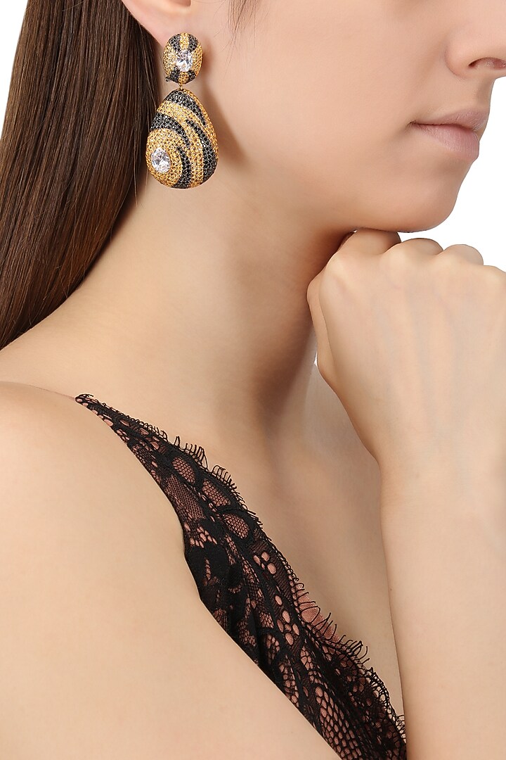 Rhodium and gold dual finish textured drop earrings available only at Pernia's Pop Up Shop.