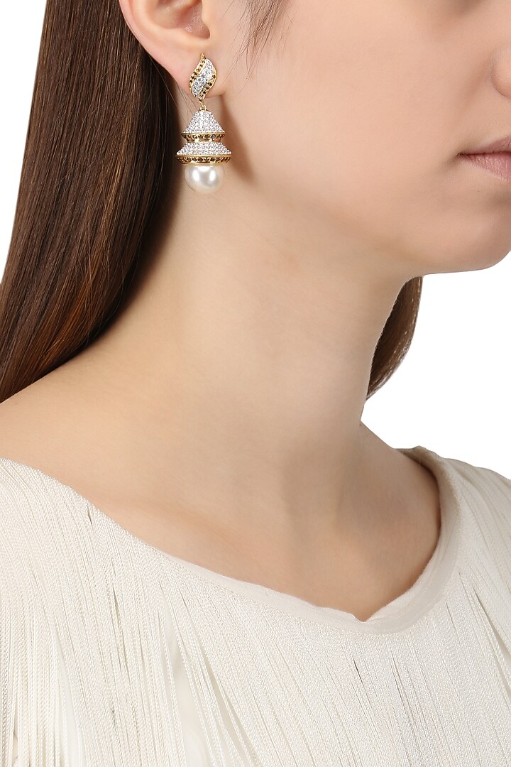 Rhodium and gold dual finish cubic zircons earrings available only at Pernia's Pop Up Shop.