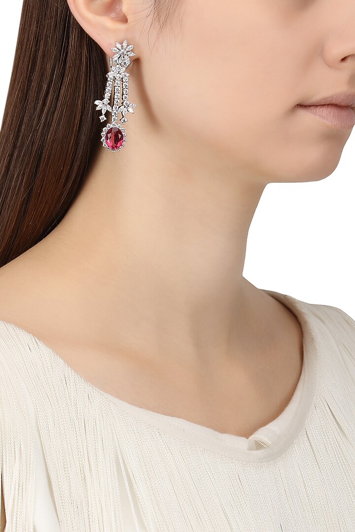 Rhodium finish zircons and red tourmaline earrings available only at Pernia's Pop Up Shop.
