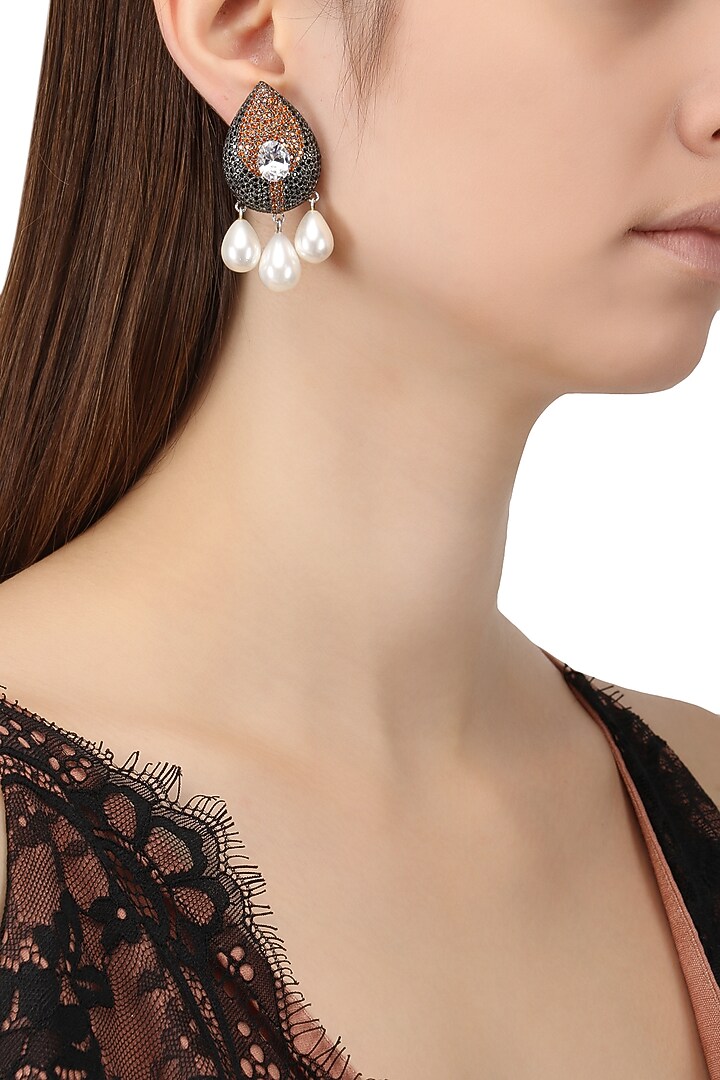 Rhodium finish zircon and swarovski textured pearl drop earrings available only at Pernia's Pop Up Shop.