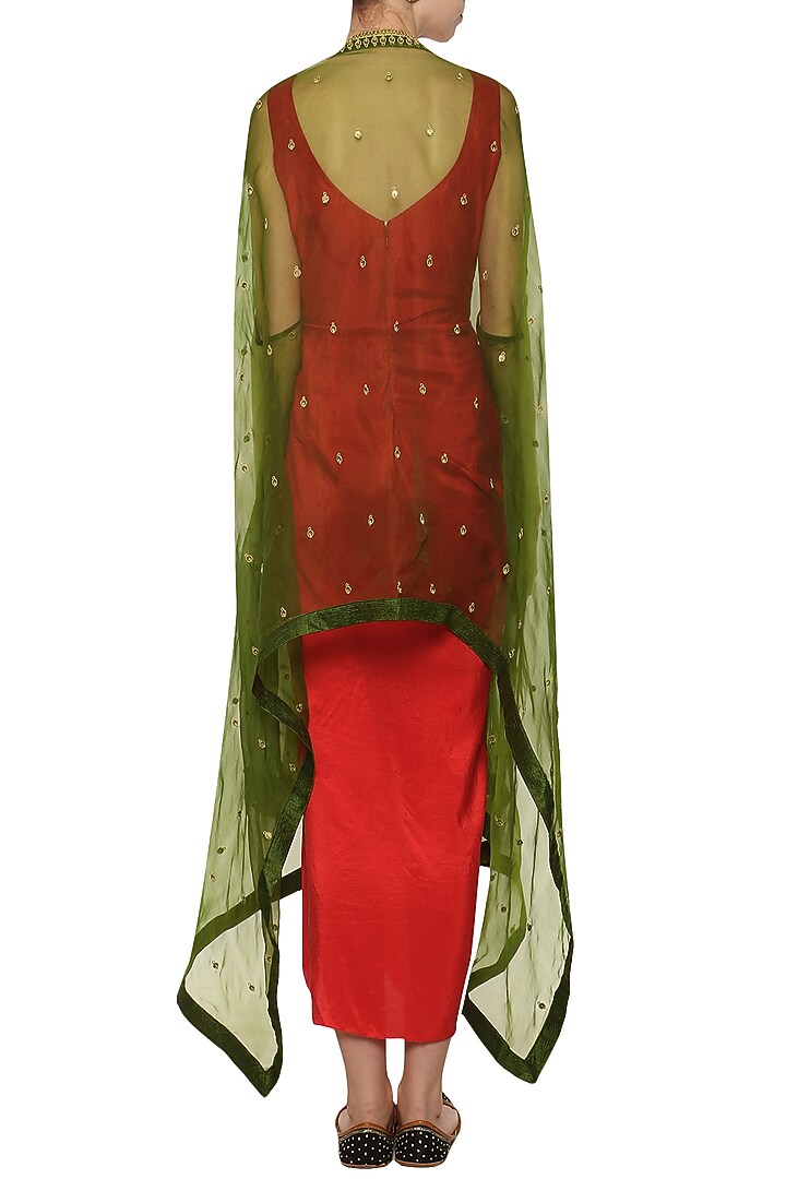 Red asymmetrical pleated dress with green embroidered cape available only at Pernia's Pop Up Shop.