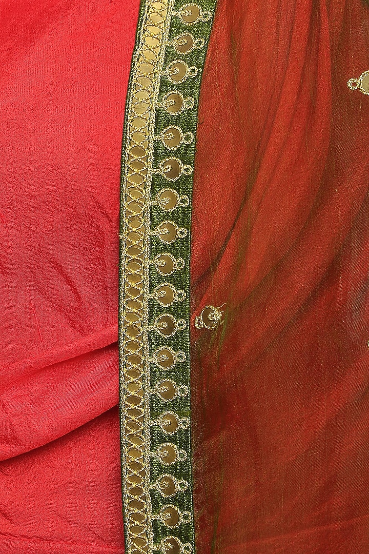 Red asymmetrical pleated dress with green embroidered cape available only at Pernia's Pop Up Shop.