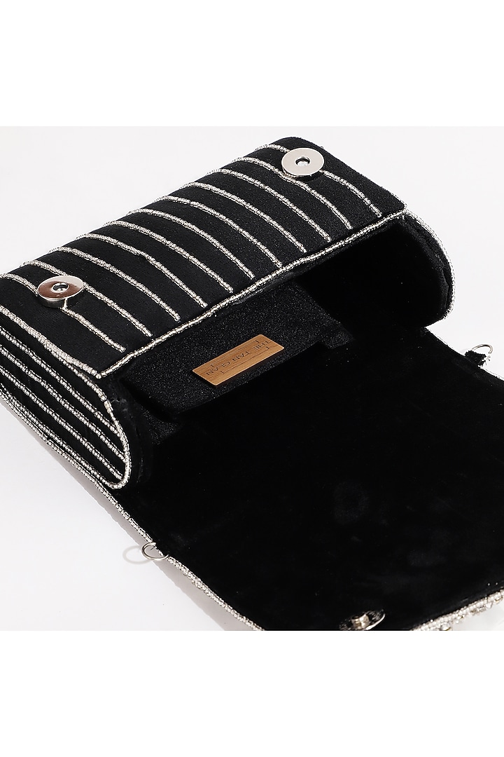 Black Suede Embellished Clutch by THE TAN CLAN at Pernia's Pop Up Shop