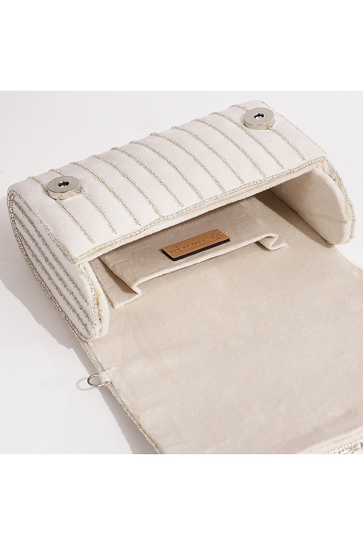 White Suede Embellished Clutch by THE TAN CLAN at Pernia's Pop Up Shop