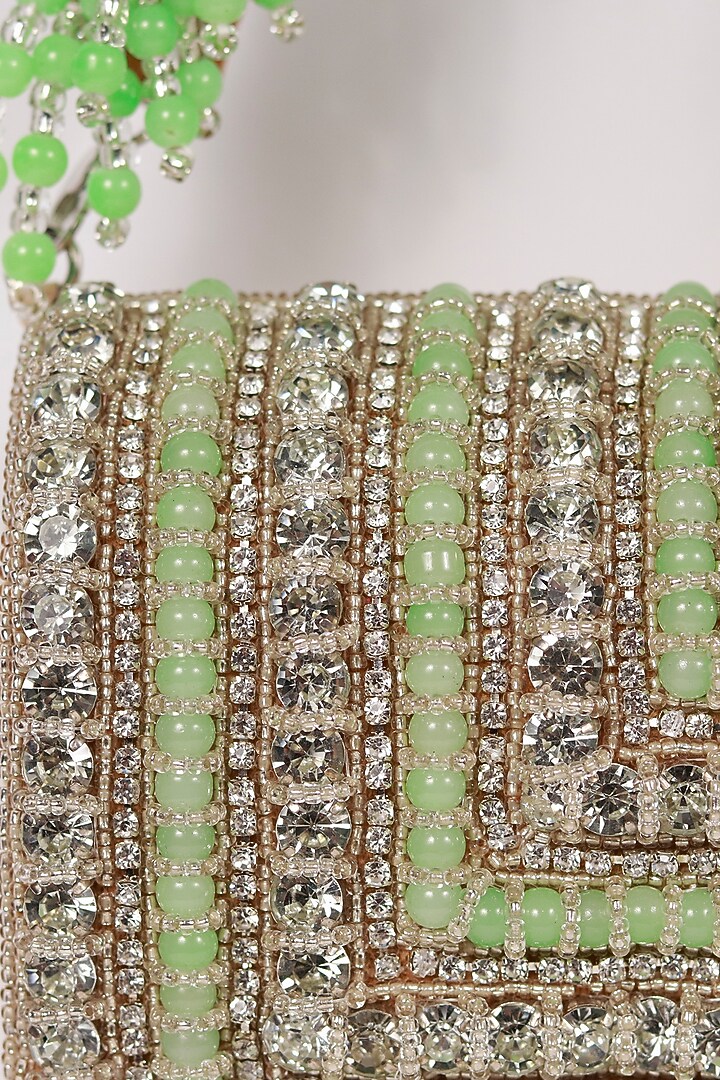 Green Suede Hand Embroidered Clutch by THE TAN CLAN at Pernia's Pop Up Shop