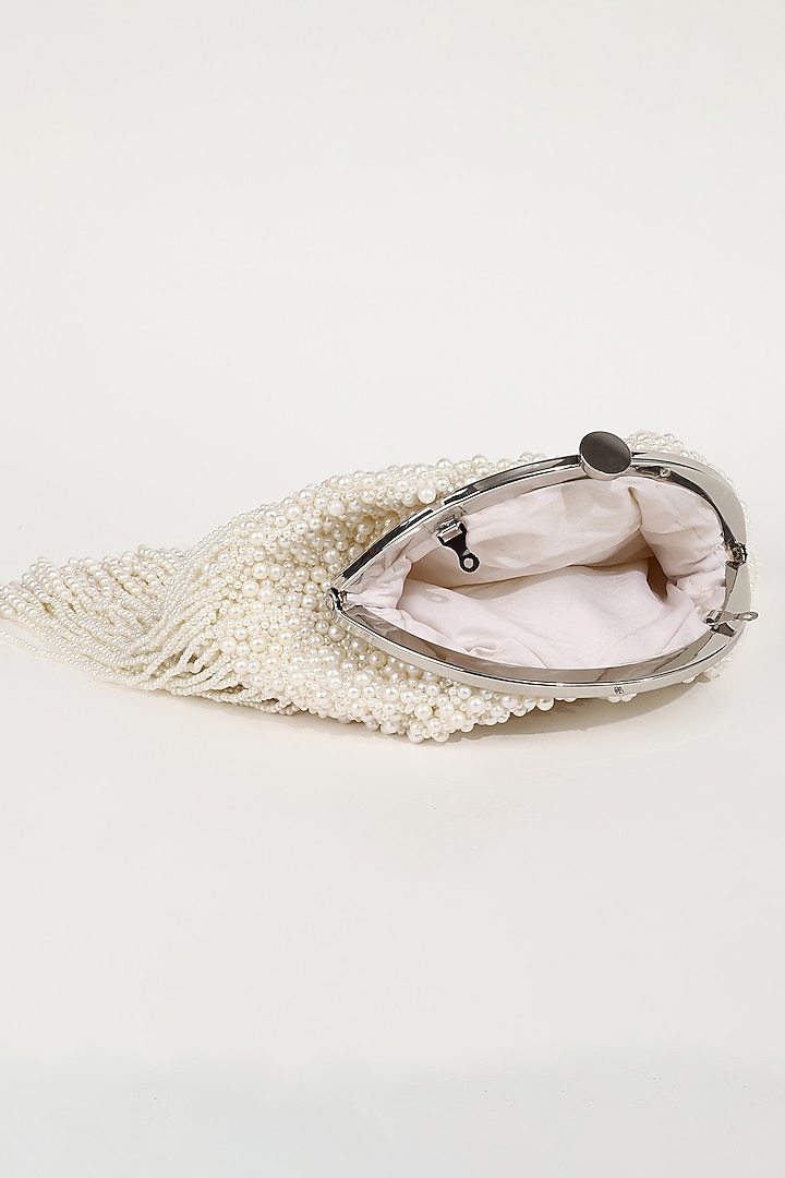 White Silk Pearl Embellished Batua Bag by THE TAN CLAN at Pernia's Pop Up Shop