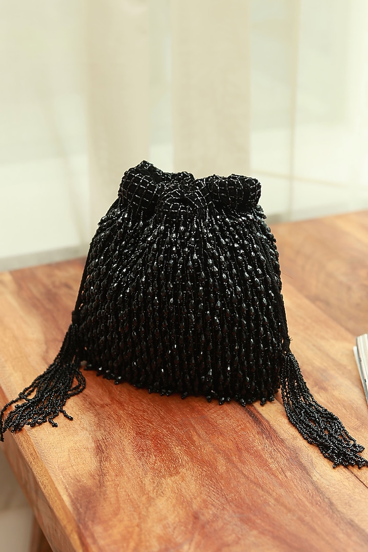Black Suede Handcrafted Potli by THE TAN CLAN at Pernia's Pop Up Shop