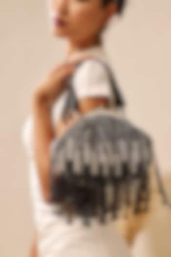 Black Suede Handcrafted Half Moon Bag by THE TAN CLAN at Pernia's Pop Up Shop