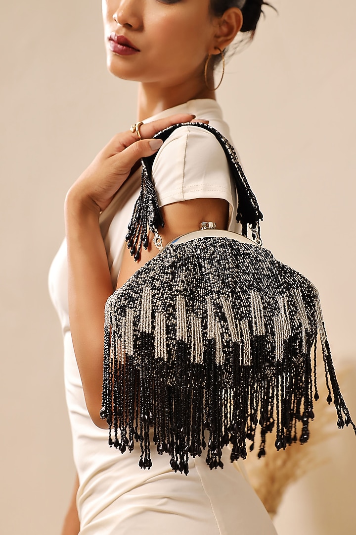 Black Suede Handcrafted Half Moon Bag by THE TAN CLAN at Pernia's Pop Up Shop