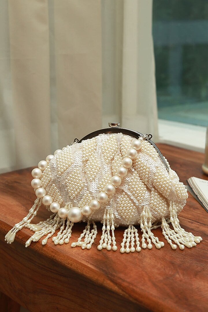 White Suede Handcrafted Half Moon Bag by THE TAN CLAN at Pernia's Pop Up Shop