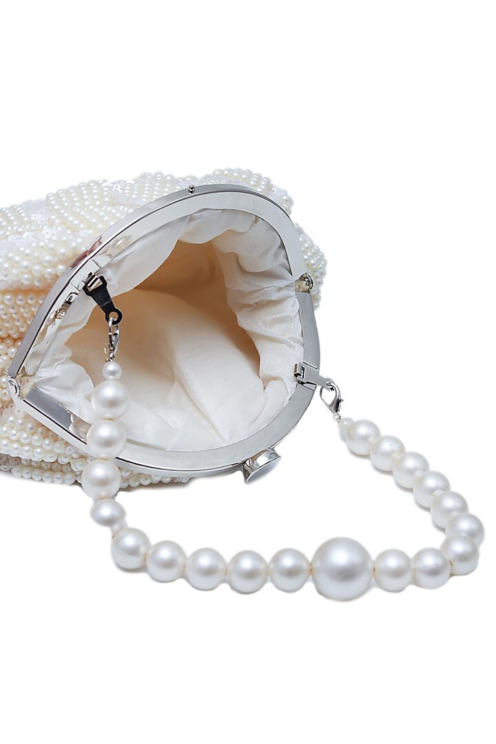 White Suede Handcrafted Half Moon Bag by THE TAN CLAN at Pernia's Pop Up Shop