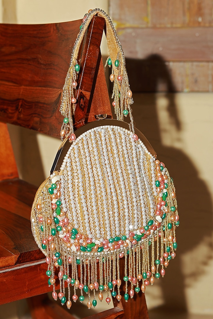 Gold Suede Handcrafted Half Moon Bag by THE TAN CLAN at Pernia's Pop Up Shop
