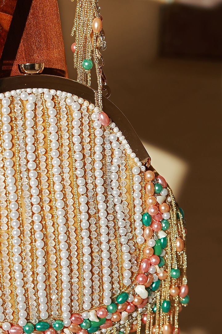 Gold Suede Handcrafted Half Moon Bag by THE TAN CLAN at Pernia's Pop Up Shop