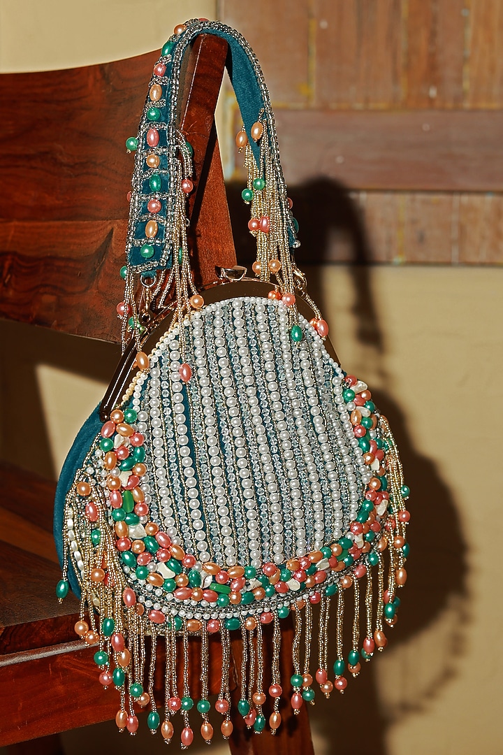 Green Suede Handcrafted Half Moon Bag by THE TAN CLAN at Pernia's Pop Up Shop