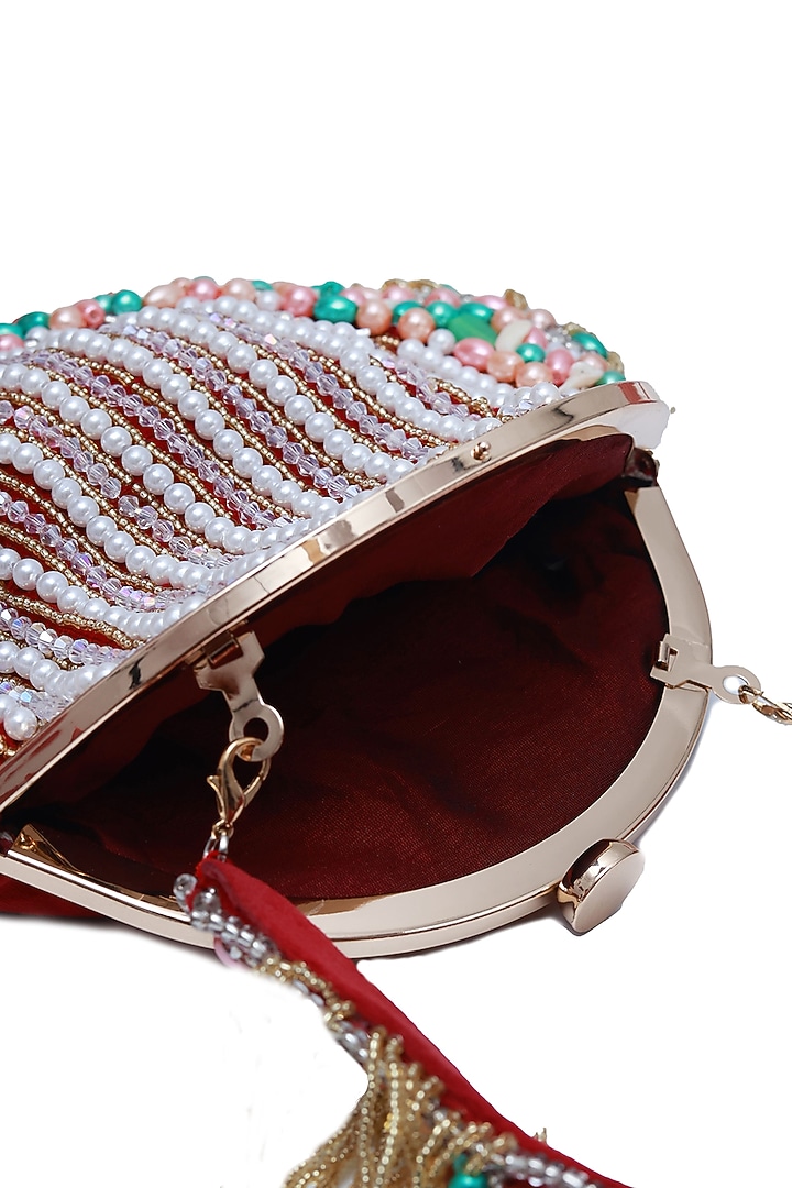 Red Suede Handcrafted Half Moon Bag by THE TAN CLAN at Pernia's Pop Up Shop