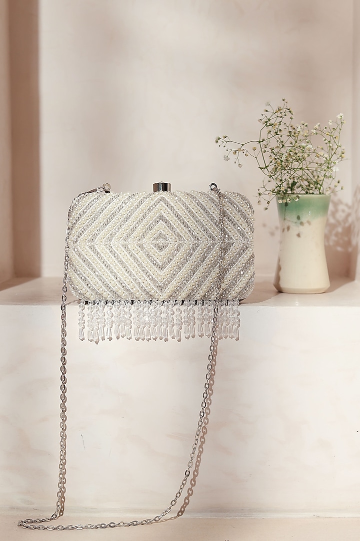 Silver Raw Silk Embroidered Clutch by THE TAN CLAN at Pernia's Pop Up Shop