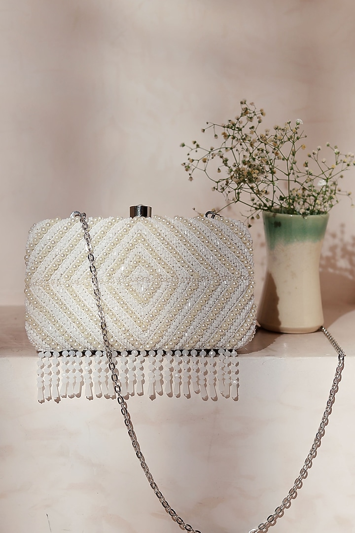 White Raw Silk Embroidered Clutch by THE TAN CLAN at Pernia's Pop Up Shop