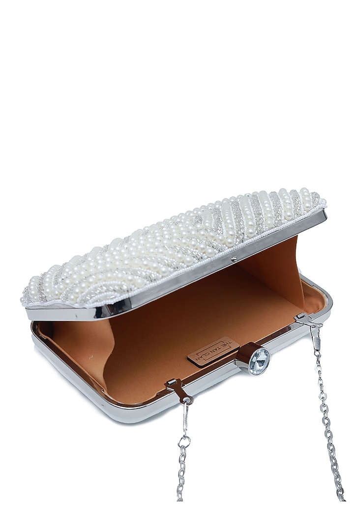 White Raw Silk Embroidered Clutch by THE TAN CLAN at Pernia's Pop Up Shop